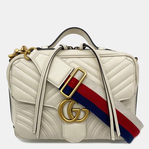 Gg Marmont Matelasse Top Handle Flap Bag - Gucci - Modalova