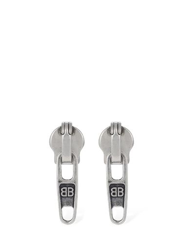 Xs Zip-up Brass Earrings - BALENCIAGA - Modalova