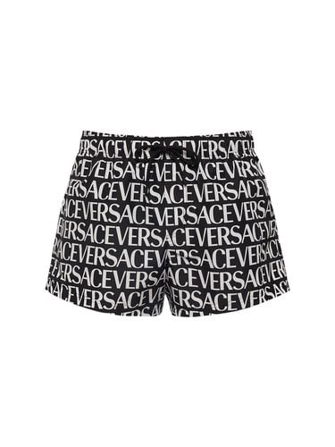 Shorts Mare In Nylon Monogram - VERSACE - Modalova