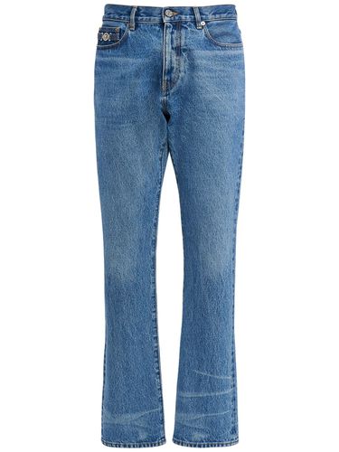 Jeans In Denim Di Cotone - VERSACE - Modalova