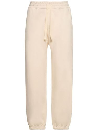 Compact Cotton Terry Sweatpants - JIL SANDER - Modalova