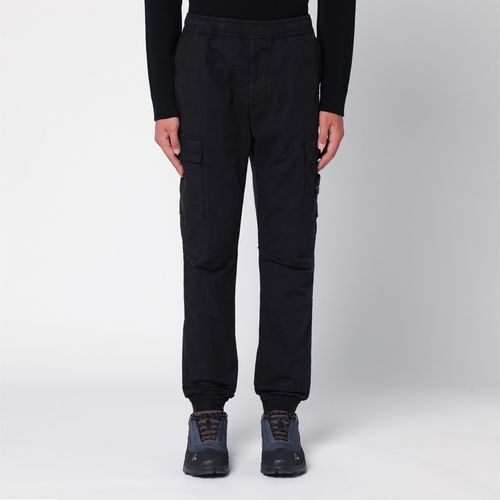 Pantalone jogging in cotone con logo - Stone Island - Modalova