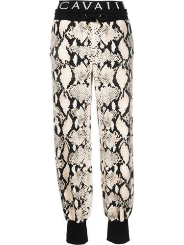 Pantalon de jogging à imprimé peau de serpent - Roberto Cavalli - Modalova