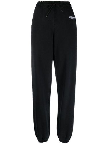 Pantalon de jogging à logo imprimé - Versace - Modalova