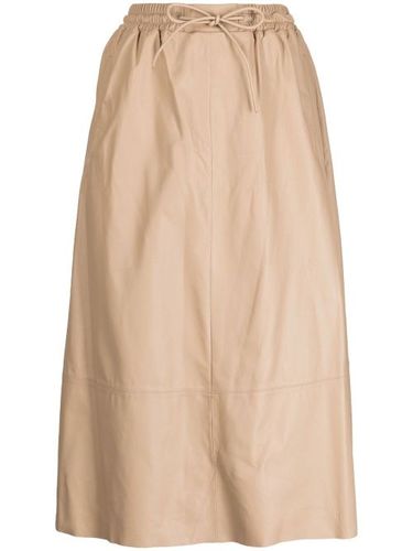 Jupe en cuir à coupe évasée - Yves Salomon - Modalova