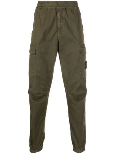 Pantalon fuselé à poches cargo - Stone Island - Modalova