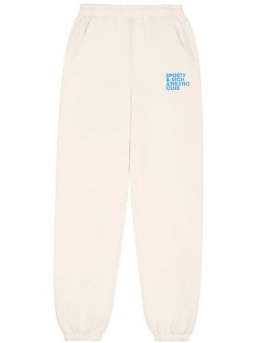 Pantalon de jogging en coton à slogan imprimé - Sporty & Rich - Modalova
