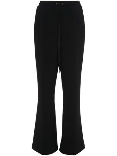 Pantalon de jogging à coupe évasée - JW Anderson - Modalova
