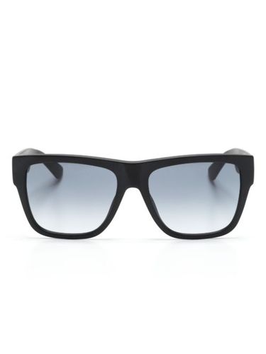 Lunettes de soleil à monture d'inspiration wayfarer - Moschino Eyewear - Modalova