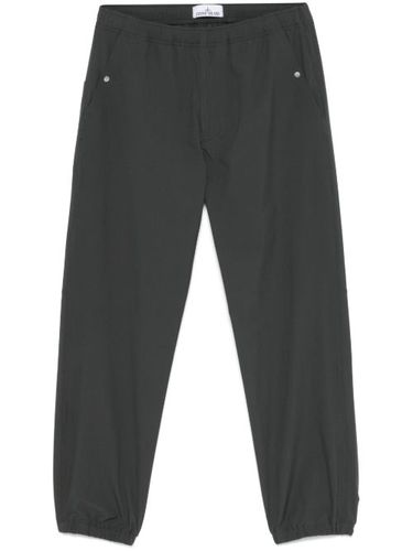Pantalon de jogging à chevilles élastiquées - Stone Island - Modalova
