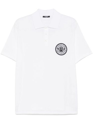 Polo à imprimé Coin - Balmain - Modalova
