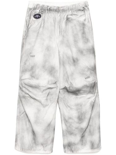 Jean skinny à effet délavé - AAPE BY *A BATHING APE® - Modalova