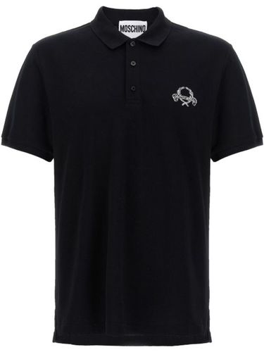 Moschino polo à logo brodé - Noir - Moschino - Modalova