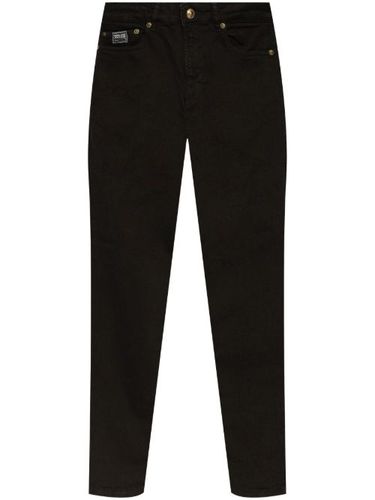 Jean à patch logo - Versace Jeans Couture - Modalova