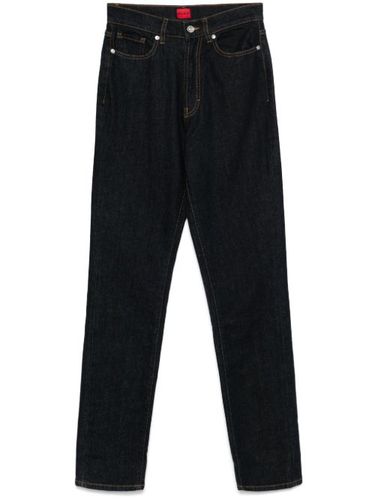 HUGO jean à patch logo - Bleu - HUGO - Modalova