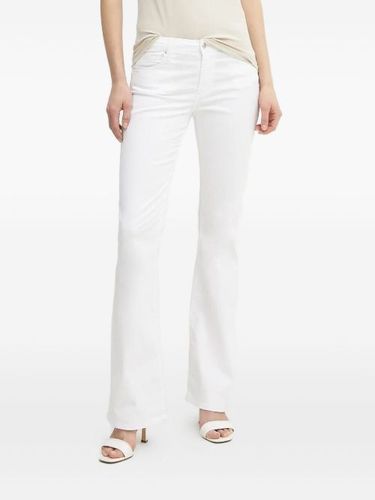 Jean évasé à patch logo - Armani Exchange - Modalova