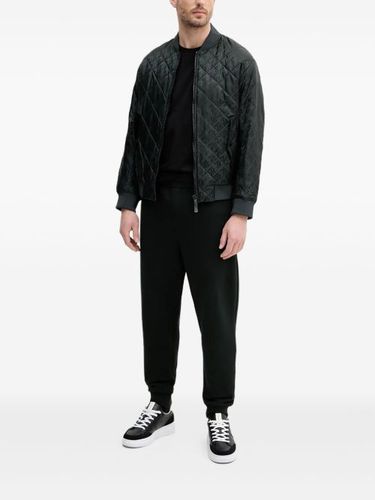 Pantalon de jogging à plaque logo - Armani Exchange - Modalova