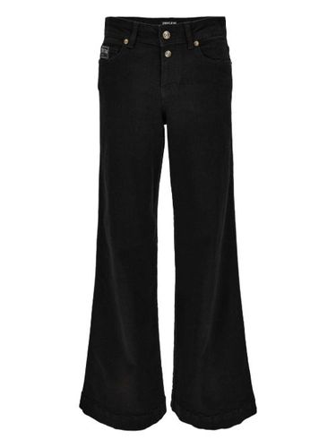 Jean à plaque logo - Versace Jeans Couture - Modalova