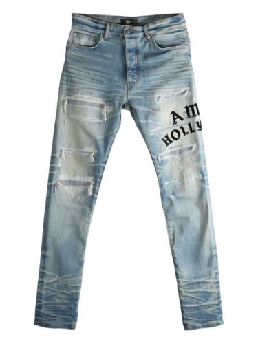 Distressed embroidered jeans - AMIRI - Modalova