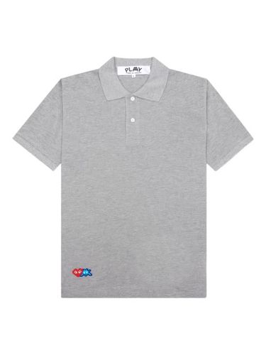 X Invader polo à motif cœur - Comme Des Garçons Play - Modalova