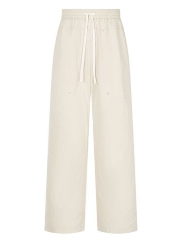 Pantalon à taille élastiquée - STUDIO TOMBOY - Modalova