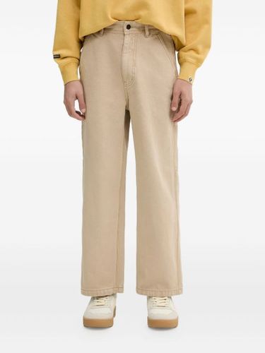 Pantalon à patch logo - A BATHING APE® - Modalova