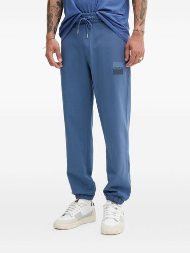 Pantalon de jogging à patch logo - HUGO - Modalova