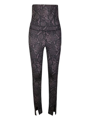 Legging à imprimé peau de serpent - adidas by Stella McCartney - Modalova