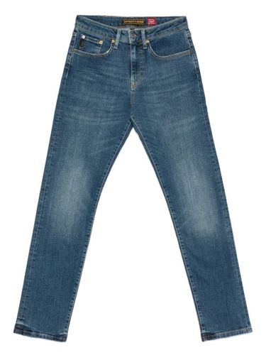 Superdry jean à patch logo - Bleu - Superdry - Modalova