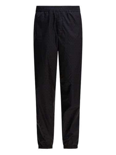 Pantalon de jogging à motif tête de mort en jacquard - Alexander McQueen - Modalova