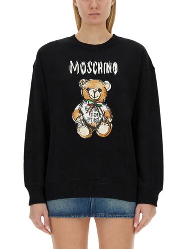 Logo Printed Crewneck Sweatshirt - Moschino - Modalova