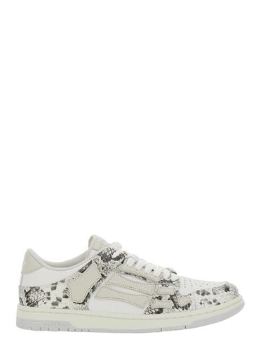 Skull Grey Low Top Sneakers With Skull Patch In Snake Printed Leather Man - AMIRI - Modalova