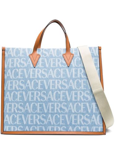 Tote Bag With All-over Logo Print In Light Blue Canvas Man - Versace - Modalova