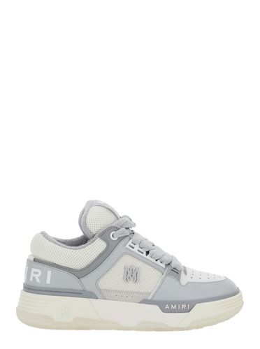 Low Top Sneakers With Logo Detail In Tech Fabric And Leather Man - AMIRI - Modalova