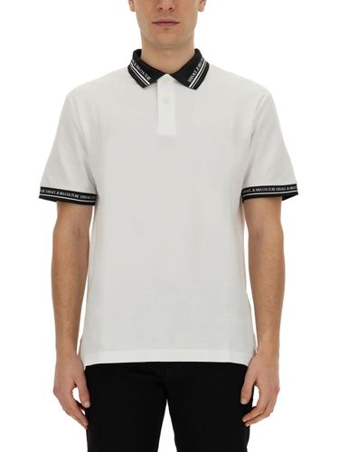 Versace Jeans Couture Monogram Polo - Versace Jeans Couture - Modalova