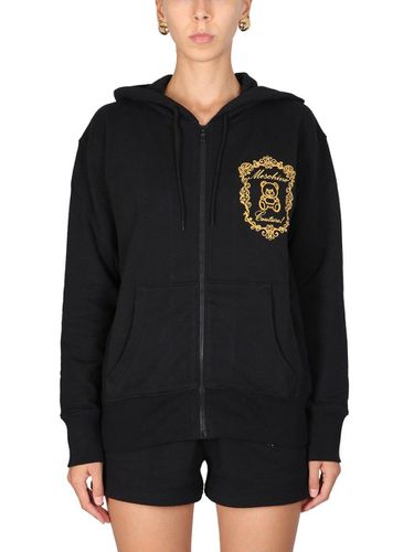 Moschino Logo Printed Zipped Hoodie - Moschino - Modalova