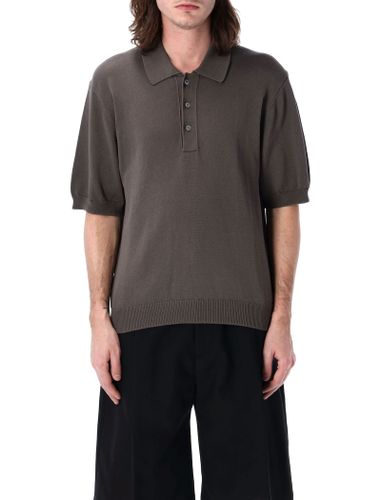 Studio Nicholson Knitted Polo Shirt - Studio Nicholson - Modalova