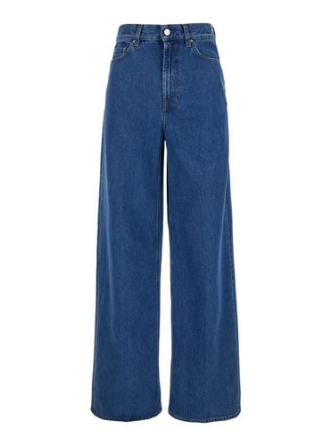 Wide Jeans With Logo Patch In Denim Woman - Totême - Modalova