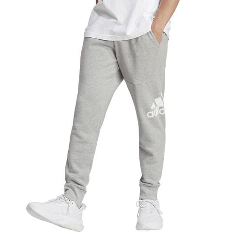 Pantaloni Affusolati In Felpa Essentials Taglie S - adidas performance - Modalova