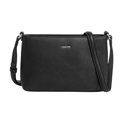 Borsa pochette cerniera e tracolla - CALVIN KLEIN - Modalova