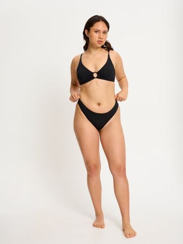 Swimwear Cheeky Bottom Light-Moderate Black - Modibodi - Modalova