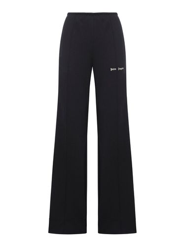 Sports trousers with side stripes - Woman - Palm Angels - Modalova