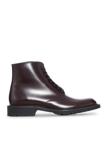 ARMY 20 CALFSKIN ANKLE BOOTS - Man - Saint Laurent - Modalova