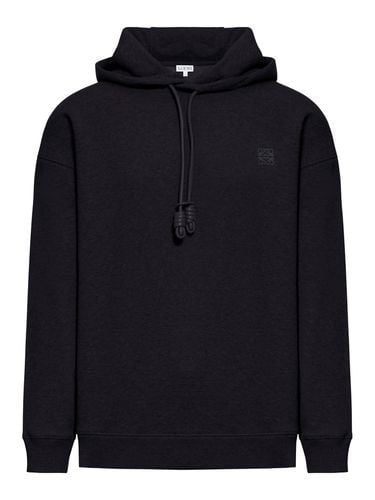 SWEATSHIRT WITH DRAWSTRING IN LEATHER AND ANAGRAM - Man - Loewe - Modalova