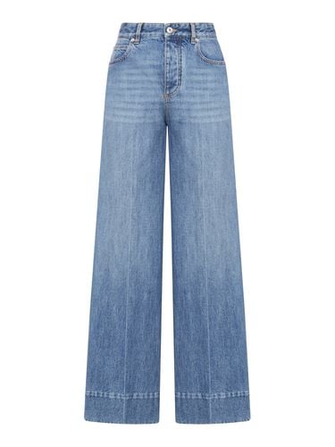 Palazzo jeans in stonewashed denim - Woman - Bottega Veneta - Modalova