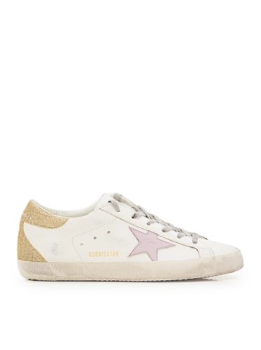 SUPERSTAR SNEAKERS IN NAPPA AND GLITTER - Woman - Golden Goose Deluxe Brand - Modalova