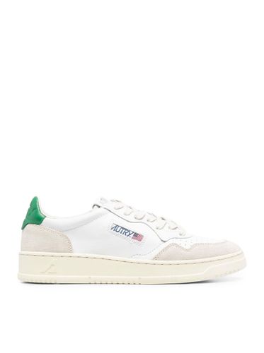 MEDALIST LOW SNEAKERS IN LEATHER AND GREEN SUEDE - - Man - Autry - Modalova