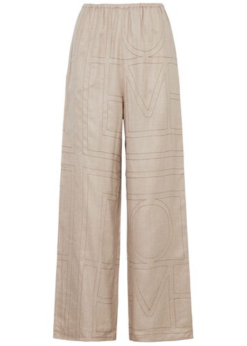 Totême Logo-embroidered Flannel Trousers - TOTÊME - Modalova