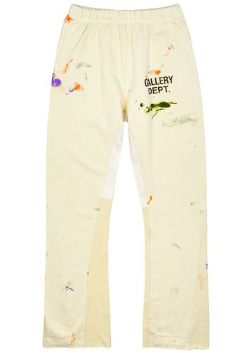 Gallery Dept. - Flared Paint-Splattered Logo-Print Cotton-Jersey Sweatpants  - Orange Gallery Dept.