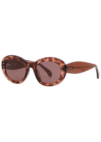 Tortoiseshell Oval-frame Sunglasses - Alaïa - Modalova